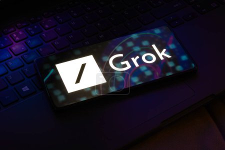 Photo for November 6, 2023, Brazil. In this photo illustration, the Grok logo is displayed on a smartphone screen. Grok is an artificial intelligence chatbot associated with the social network X, created by Elon Musk - Royalty Free Image