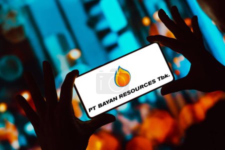 Photo for December 13, 2023, Brazil. In this photo illustration, the Bayan Resources logo is displayed on a smartphone screen - Royalty Free Image