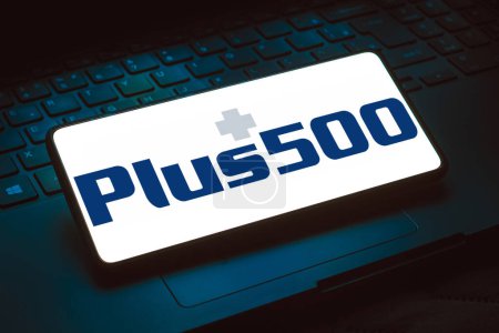 Photo for December 18, 2023, Brazil. In this photo illustration, the Plus500 logo is displayed on a smartphone screen - Royalty Free Image