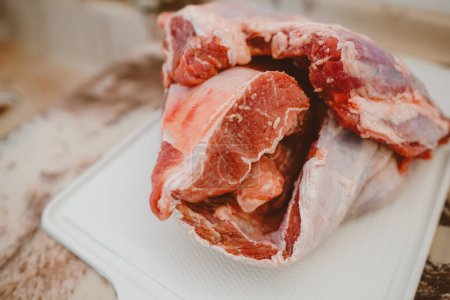Photo for Piece of raw red beef chuck meat with fat. Brazil is the second largest producer and largest exporter of beef in the world. - Royalty Free Image