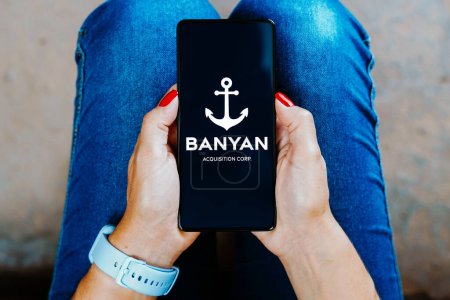Photo for December 30, 2023, Brazil. In this photo illustration, the Banyan Acquisition Corporation logo is displayed on a smartphone screen - Royalty Free Image