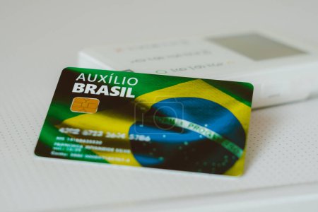 Téléchargez les photos : 17 janvier 2024, Brésil. Sur cette photo, la carte Auxlio Brasil (Bolsa Famlia). - en image libre de droit