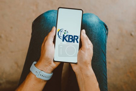 Photo for January 24, 2024, Brazil. In this photo illustration, the KBR, Inc. logo is displayed on a smartphone screen - Royalty Free Image