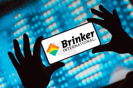 Photo for February 14, 2024, Brazil. In this photo illustration, the Brinker International, Inc. logo is displayed on a smartphone screen - Royalty Free Image