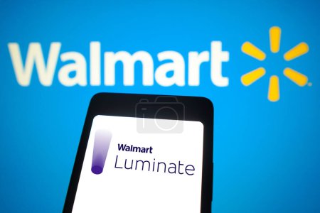 Photo for February 21, 2024, Brazil. In this photo illustration, the Walmart Luminate logo is displayed on a smartphone screen and in the background, Walmart logo. - Royalty Free Image