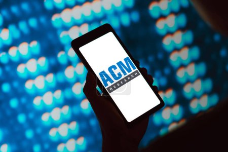Photo for February 26, 2024, Brazil. In this photo illustration, the ACM Research logo is displayed on a smartphone screen - Royalty Free Image
