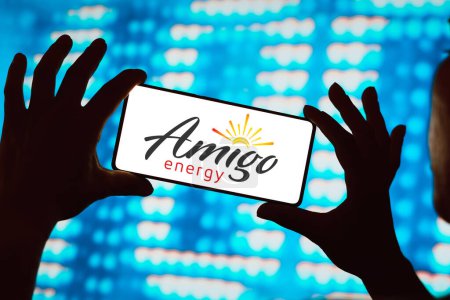 Photo for February 27, 2024, Brazil. In this photo illustration, the Amigo Energy logo is displayed on a smartphone screen - Royalty Free Image