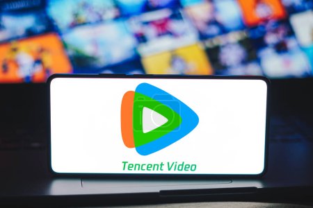Photo for March 1, 2024, Brazil. In this photo illustration, the Tencent Video logo is displayed on a smartphone screen - Royalty Free Image