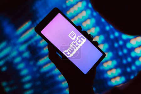 Photo for March 1, 2024, Brazil. In this photo illustration, the Twitch logo is displayed on a smartphone screen - Royalty Free Image