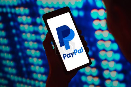 Photo for March 6, 2024, Brazil. In this photo illustration, the PayPal logo is displayed on a smartphone screen - Royalty Free Image