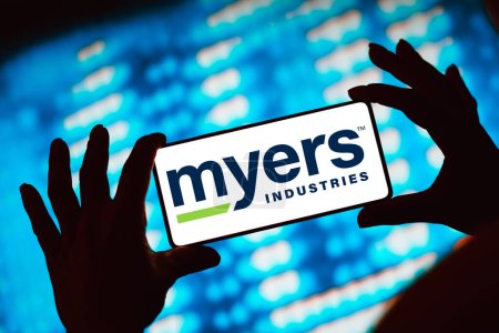 Photo for March 22, 2024, Brazil. In this photo illustration, the Myers Industries, Inc. logo is displayed on a smartphone screen - Royalty Free Image