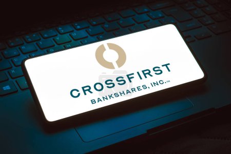 Photo for April 16, 2024, Brazil. In this photo illustration, the CrossFirst Bankshares, Inc. logo is displayed on a smartphone screen - Royalty Free Image