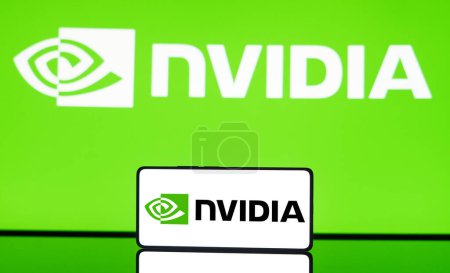 Photo for May 6, 2024, Brazil. In this photo illustration the Nvidia logo is displayed on a smartphone screen and in the background - Royalty Free Image
