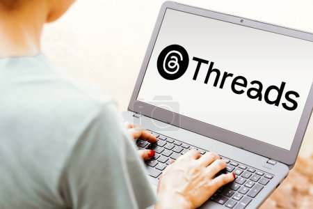 Photo for May 6, 2024, Brazil. In this photo illustration, the Threads logo is seen displayed on a laptop screen - Royalty Free Image
