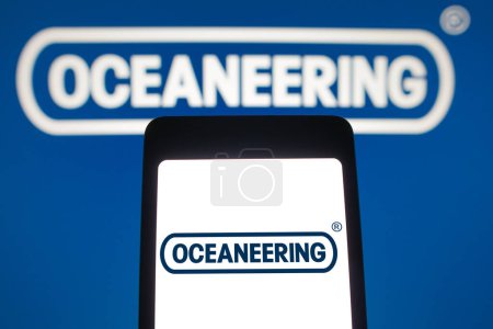 Téléchargez les photos : 4 juin 2024, Brésil. Dans cette illustration photo, le logo Oceaneering International est affiché sur un écran de smartphone. - en image libre de droit