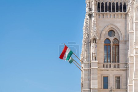 Photo for Hungarian Flag at Hungarian Parliament Building - Budapest, Hungary - Royalty Free Image