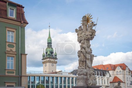 Photo for Holy Trinity Column at Cabbage Market Square (Zelny trh) and Old Town Hall Tower - Brno, Czech Republic - Royalty Free Image