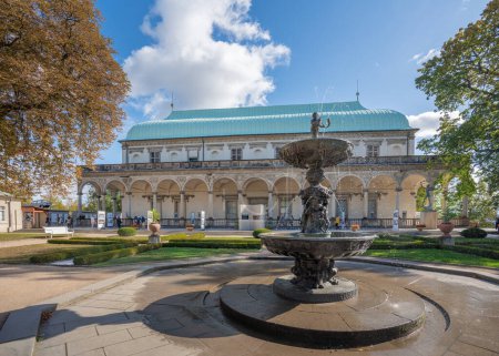 Photo for Prague, Czechia - Sep 30, 2019: Singing fountain and Queen Annes Summer Palace at Royal Garden of Prague Castle - Prague, Czech Republic - Royalty Free Image