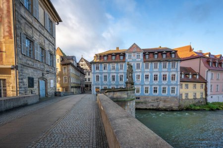 Photo for Empress Cunigunde Statue and Heller Haus at Lower Bridge (Untere Brucke) - Bamberg, Bavaria, Germany - Royalty Free Image