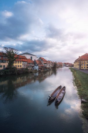 Photo for Regnitz River riverbank with small boats and old houses - Bamberg, Bavaria, Germany - Royalty Free Image