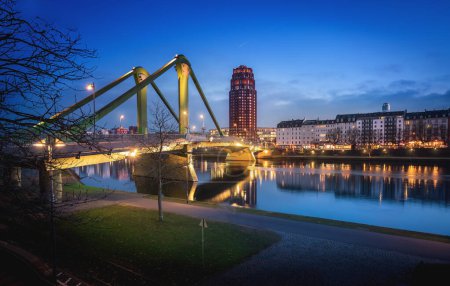 Photo for Flosserbrucke Bridge, Main Plaza Building and River Main at night - Frankfurt, Germany - Royalty Free Image