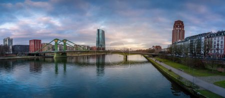 Photo for Panoramic view of Main River skyline with Flosserbrucke Bridge, ECB Tower (European Central Bank) and Main Plaza Building - Frankfurt, Germany - Royalty Free Image
