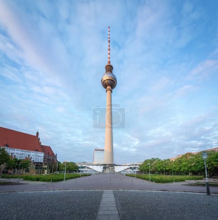 Photo for TV Tower (Fernsehturm) Pope Revenge effect with sun shining in the shape of a cross - Berlin, Germany - Royalty Free Image