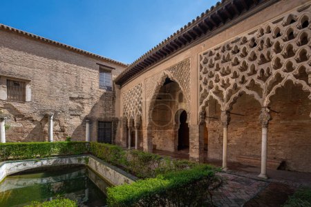 Photo for Seville, Spain - Apr 3, 2019: Patio del Yeso (Plaster Yard) at Alcazar (Royal Palace of Seville) - Seville, Andalusia, Spain - Royalty Free Image