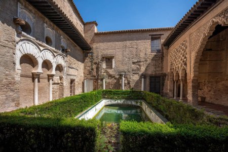 Photo for Seville, Spain - Apr 3, 2019: Patio del Yeso (Plaster Yard) at Alcazar (Royal Palace of Seville) - Seville, Andalusia, Spain - Royalty Free Image