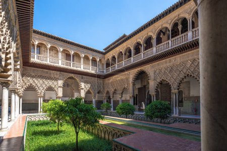 Photo for Seville, Spain - Apr 3, 2019: Maidens Courtyard (Patio de las Doncellas) at Alcazar (Royal Palace of Seville) - Seville, Andalusia, Spain - Royalty Free Image
