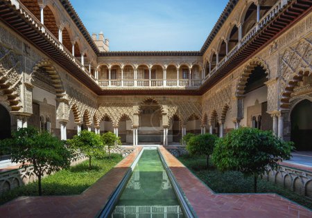 Photo for Seville, Spain - Apr 3, 2019: Maidens Courtyard (Patio de las Doncellas) at Alcazar (Royal Palace of Seville) - Seville, Andalusia, Spain - Royalty Free Image