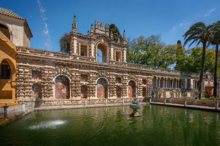 Photo for Seville, Spain - Apr 3, 2019: Mercury Pond (Estanque de Mercurio) at Alcazar Gardens (Royal Palace of Seville) - Seville, Andalusia, Spain - Royalty Free Image