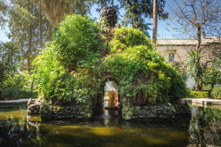 Photo for Seville, Spain - Apr 3, 2019: Grotto at Garden of the Cross (Jardin de La Cruz) of Alcazar (Royal Palace of Seville) - Seville, Andalusia, Spain - Royalty Free Image
