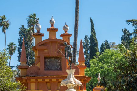 Photo for Seville, Spain - Apr 3, 2019: Neptune fountain at Ladies Garden (Jardin de las damas) of Alcazar (Royal Palace of Seville) - Seville, Andalusia, Spain - Royalty Free Image
