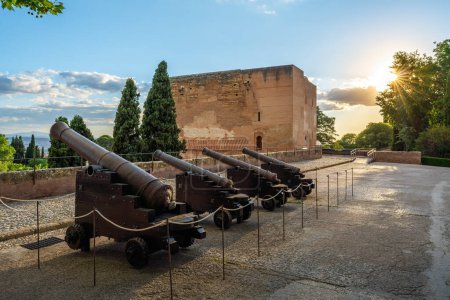 Photo for Old French Cannons and Gate of Justice (Puerta de la Justicia) at Alhambra - Granada, Andalusia, Spain - Royalty Free Image