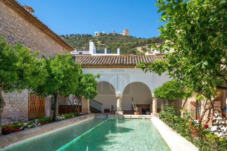 Photo for Jaen, Spain - Jun 1,  2019: La Magdalena Church courtyard with Castle of Santa Catalina - Jaen, Spain - Royalty Free Image