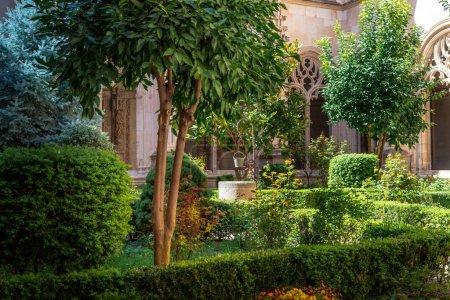 Photo for Toledo, Spain - Mar 27, 2019: Well of Cloister Garden at Monastery of San Juan de los Reyes - Toledo, Spain - Royalty Free Image