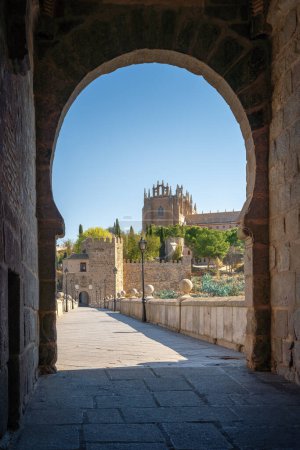 Photo for San Martin Bridge and Monastery of San Juan de los Reyes - Toledo, Spain - Royalty Free Image