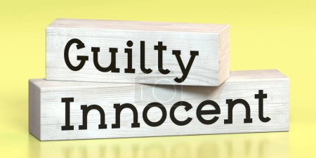 Innocent, guilty - words on wooden blocks - 3D illustration