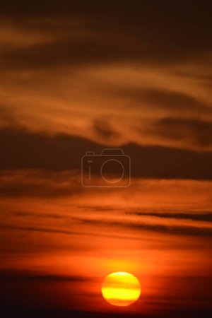 Sunset sky with clouds - vertical photograph