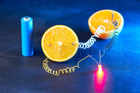 Photo for Free energy electricity generator using oranges. - Royalty Free Image