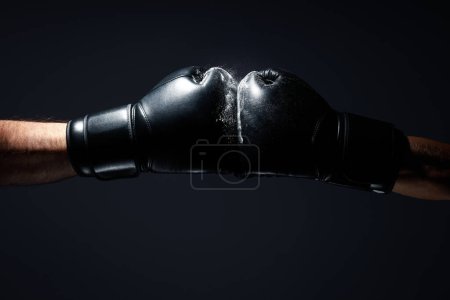 Photo pour Concept of boxing and sport lifestyle with boxing gloves - image libre de droit