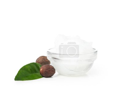 Bowl with Shea butter and ingredients isolated on white background