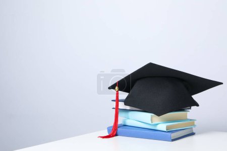 Graduation in high school and university concept, space for text