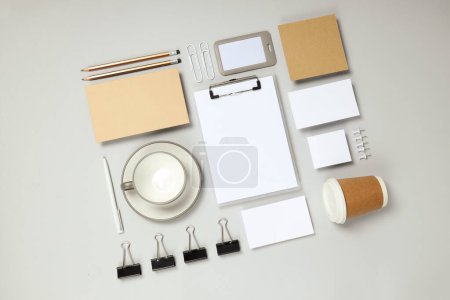 Photo for Mockup flat lay with different office accessories on light gray background - Royalty Free Image