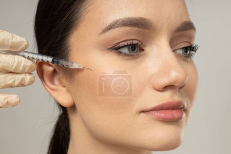 Photo for Concept of beauty and botox with young woman - Royalty Free Image