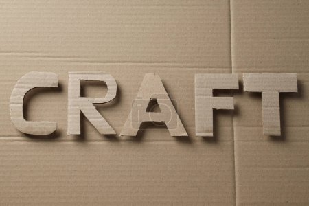 Foto de La palabra "CRAFT" se corta de cartón. - Imagen libre de derechos