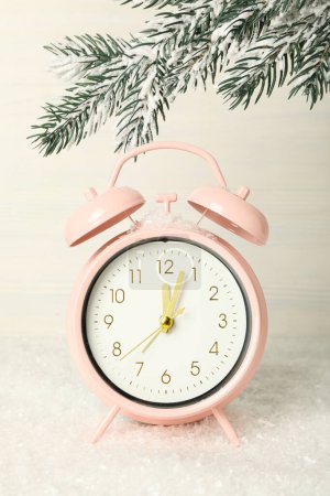 Photo for New Year's decor with a clock, top view. - Royalty Free Image