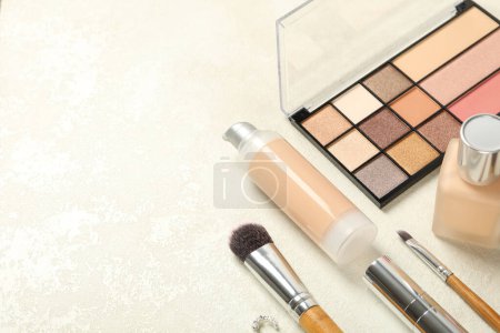 Photo for Women's makeup tools on a white table - Royalty Free Image