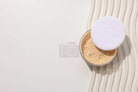 Photo for Face powder, light shade on a light background. - Royalty Free Image